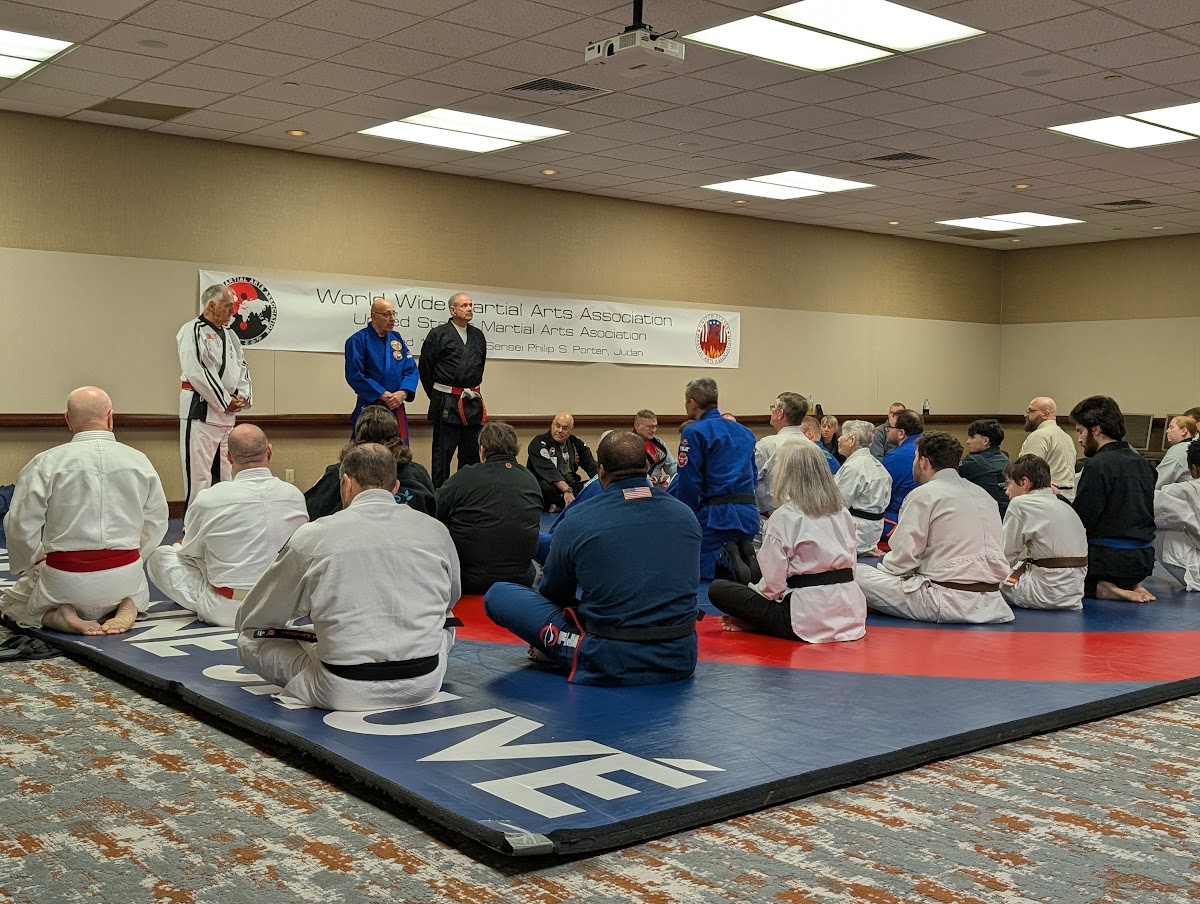 Martial arts summer camp students practicing judo throws at WWMAA intensive training program