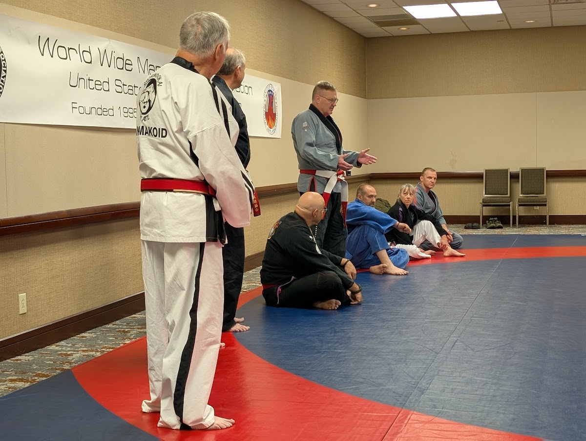 Advanced martial arts practitioners training at WWMAA intensive summer program